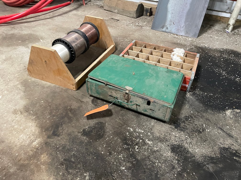 Fishing Line, Camp Stove, and Wooden Coca-Cola Crate