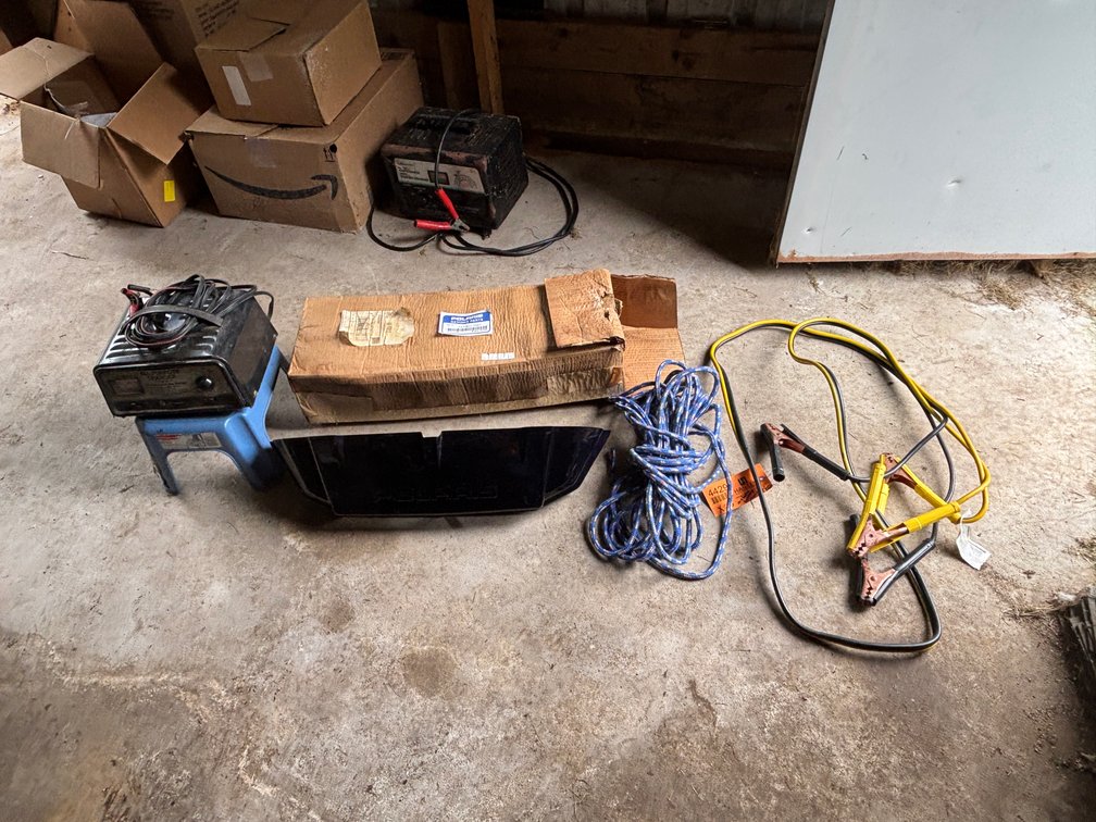 Polaris Snowmobile Front Bumper, Battery Charger, and Jumper Cables