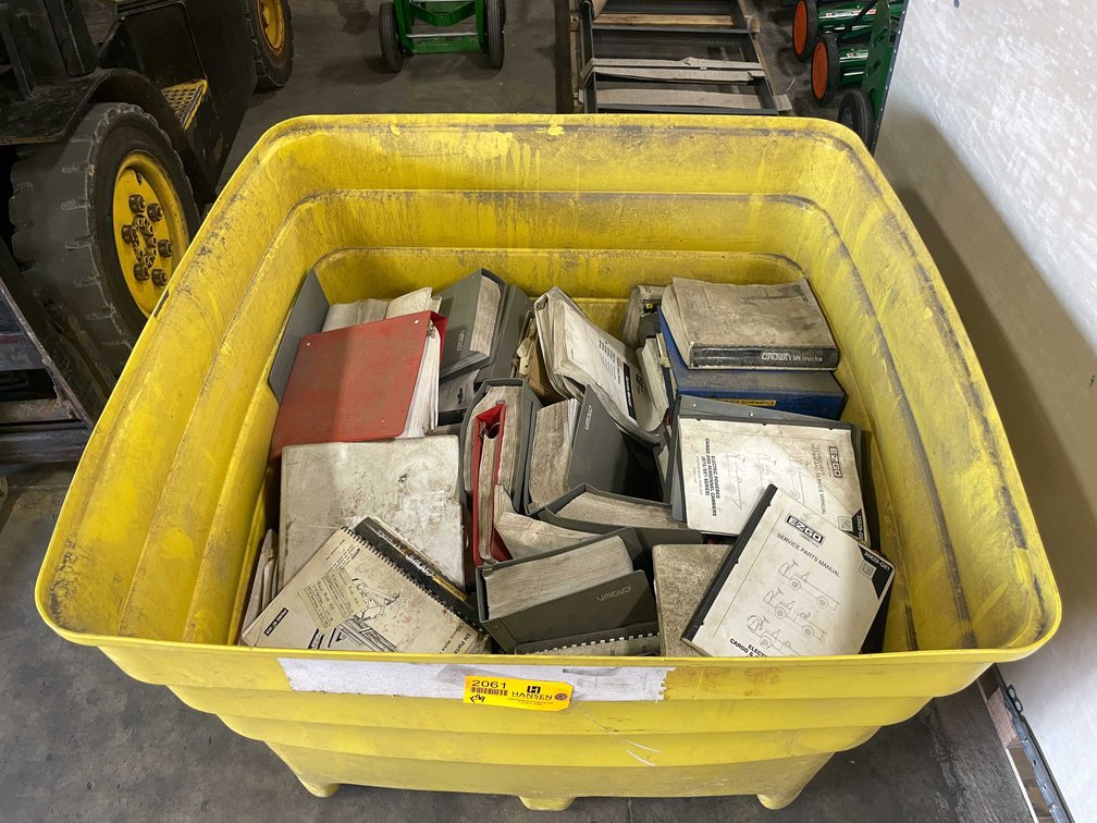 Large Bin of Manuals. (  E  )