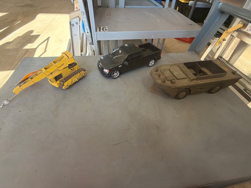 (3) Toy Vehicles Including Crawler Crane, Pickup Truck, and Amphibious Vehicle