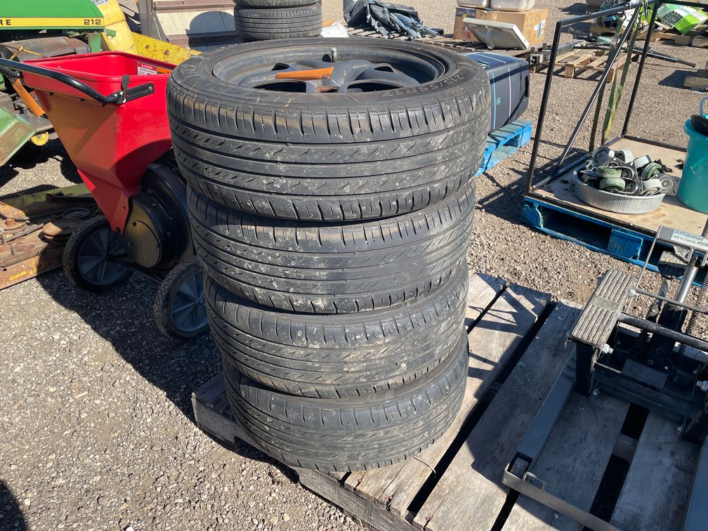 (4) Sentury Touring Tires on 5-Bolt Rims
