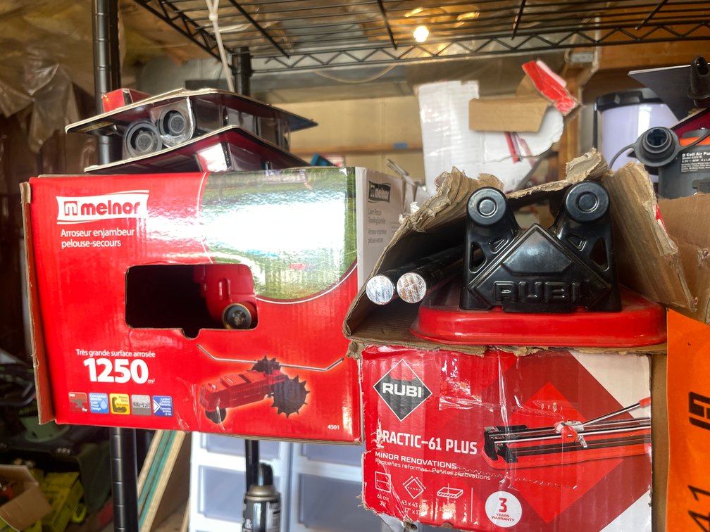 (2) Rubi Tile Cutters and Meinor Walking Sprinkler (Fountain City, WI)