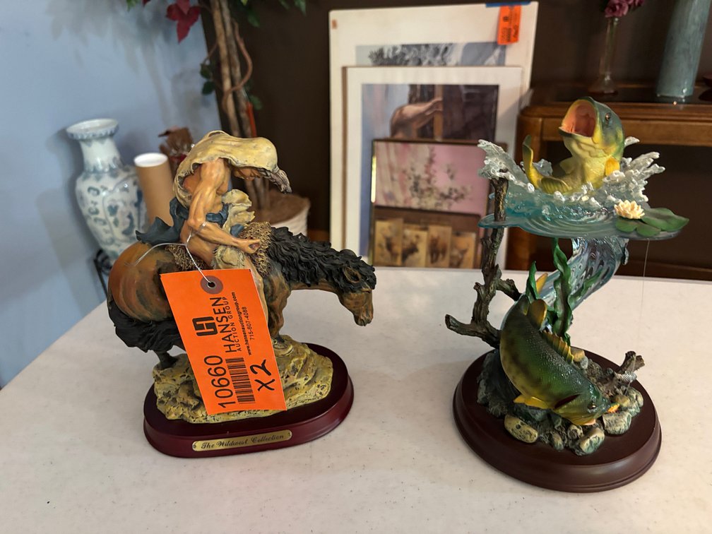(2) Statues
