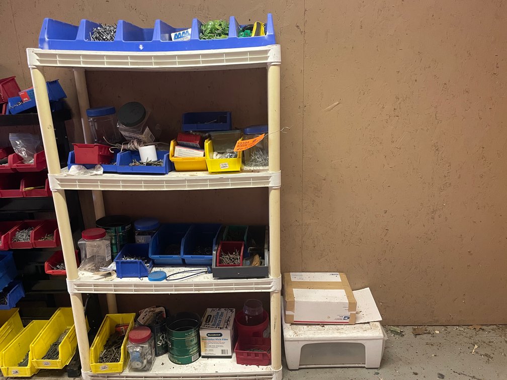 Four Tier Plastic Shelf with Contents