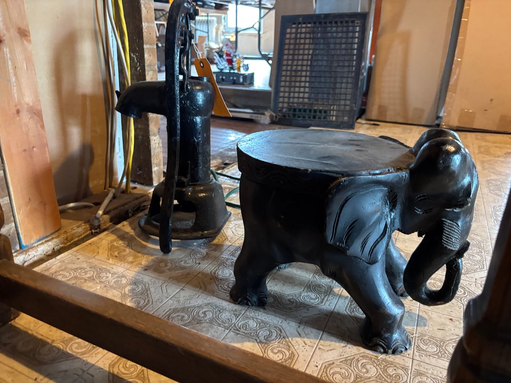 Cast Iron Water Pump and Wood Elephant Plant Stand