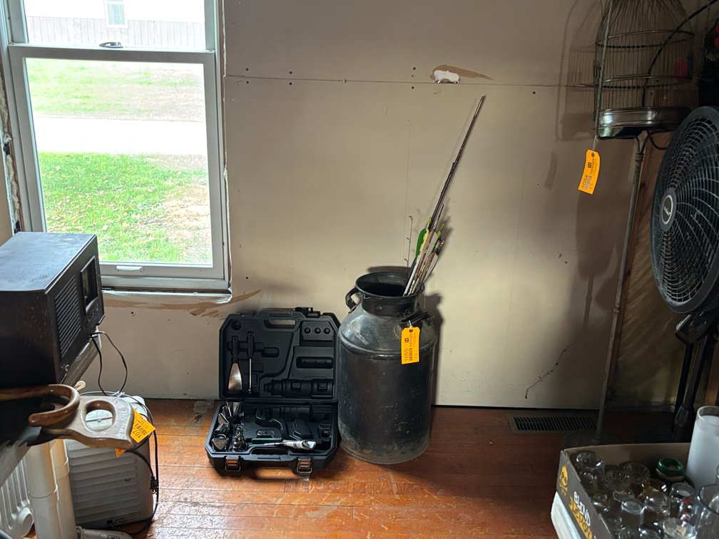 Milk Can, Arrows, and Tools