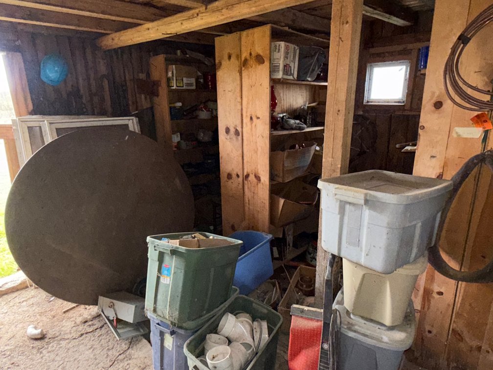 Shed Contents Including Shelving Units, Tools, Hardware, Storage Totes, and More