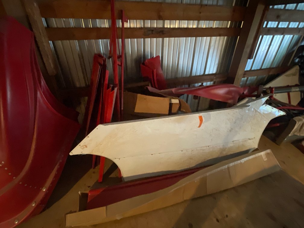 Red and White Body Panels, Metal Framing Pieces, and More