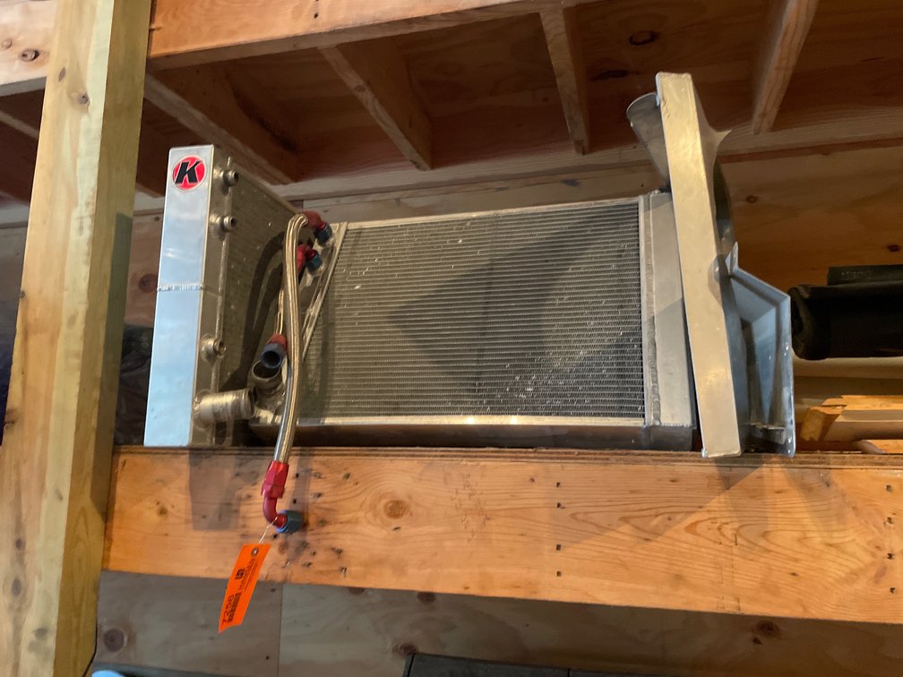 Aluminum Radiator, Exhaust Headers, and Concrete Mix