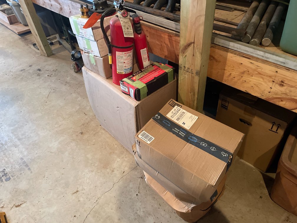 (2) Fire Extinguishers and Automotive Parts Including Connecting Rods, Valve Springs, and Pulley