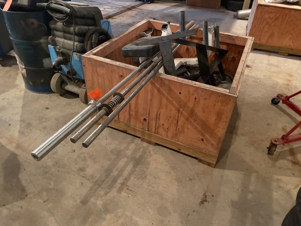 Gym Equipment Including Barbells, Weight Plates, Dumbbells, Bench Frame, and More