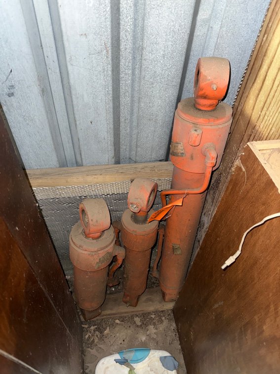 (3) Orange Hydraulic Cylinders