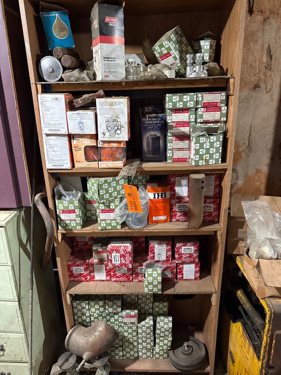 Wooden Shelving Unit with Equipment Filters and Parts