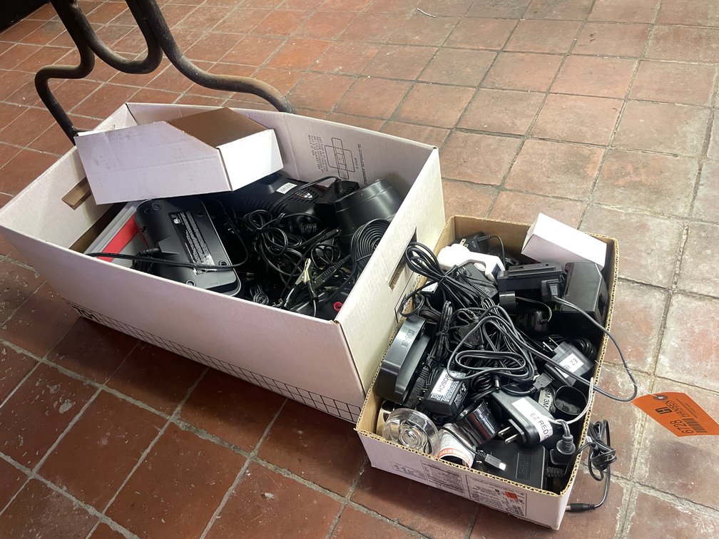 Assortment of Power Tool Batteries and Chargers
