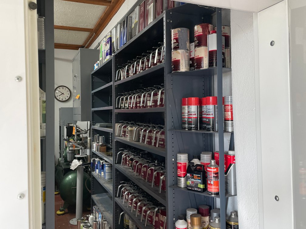Shelving Units and Large Quantity of Paint