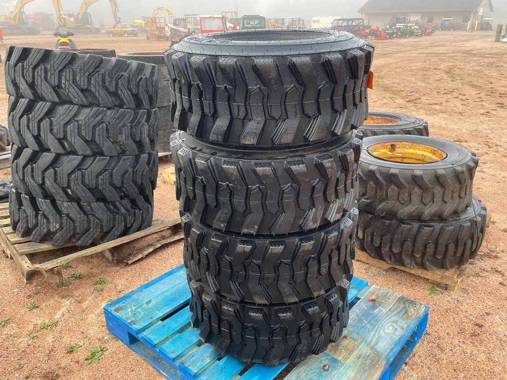 Set of (4) New 12-16.5 Skidsteer Tires