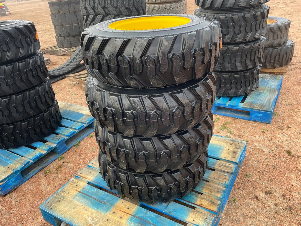 Set of (4) New 10-16.5 Skidsteer Tires on Rims