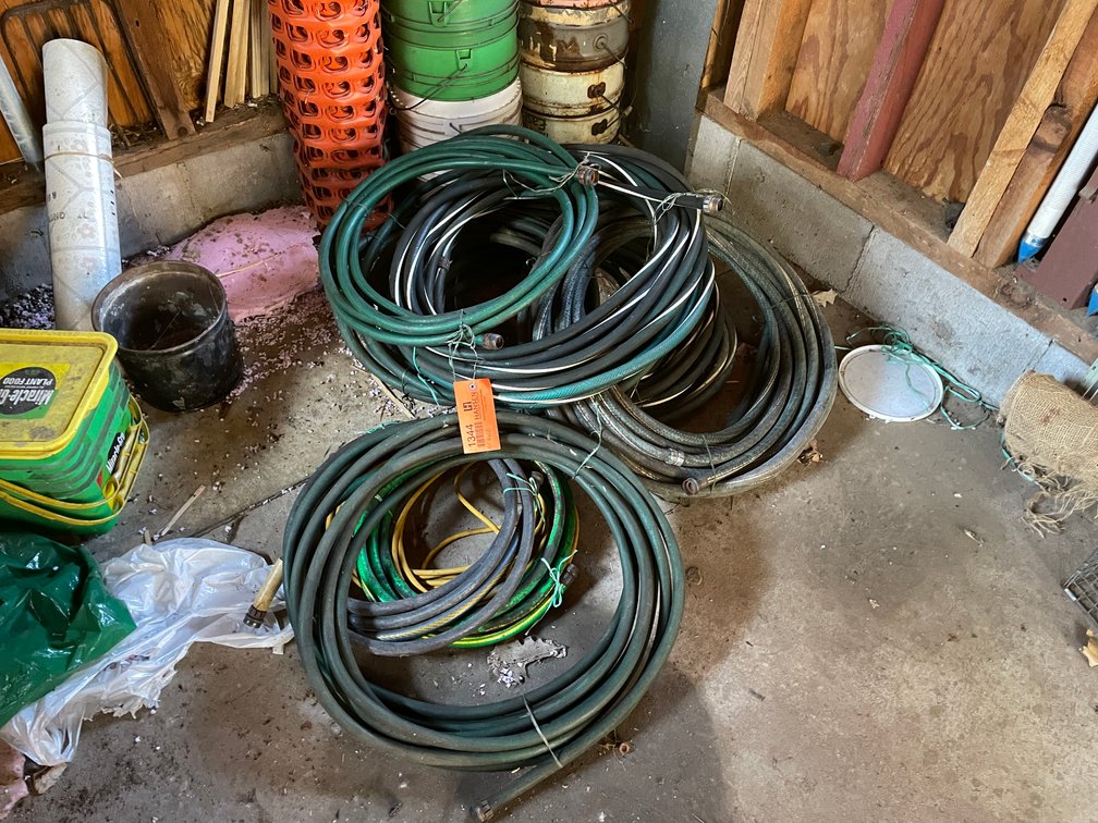Pile of Assorted Garden Hoses