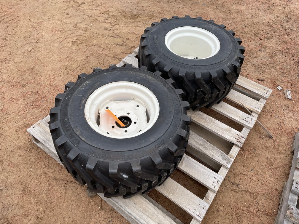 (2) 12-16.5 NHS Tires on Rims