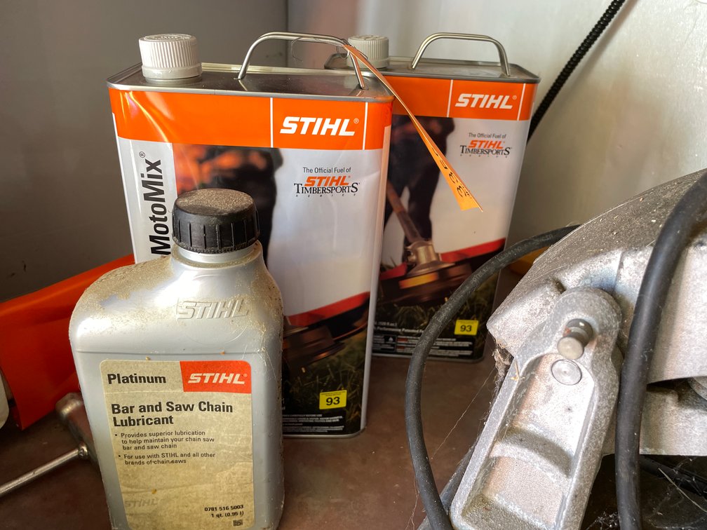 (2) Stihl MotoMix and Stihl Bar and Saw Chain Lubricant Bottles
