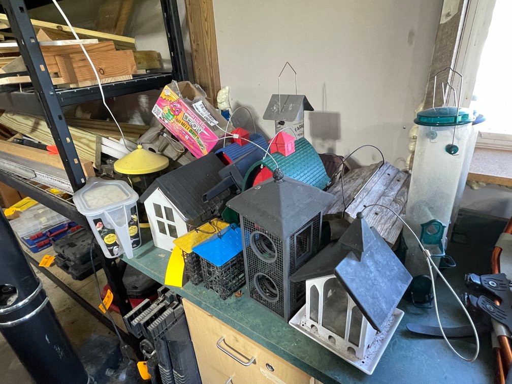 Pile of Various Bird Feeders