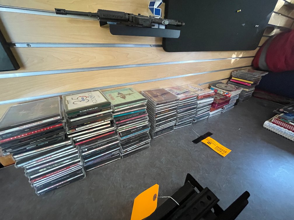 (9) Stacks of C.D.s