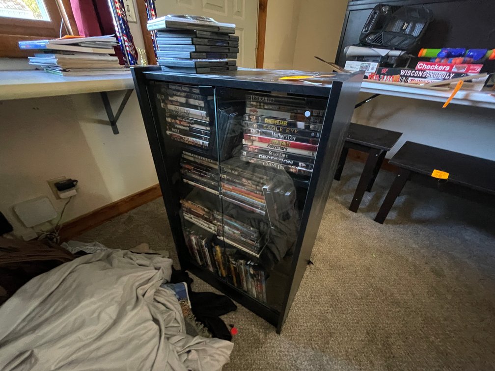 Cabinet with D.V.D.s