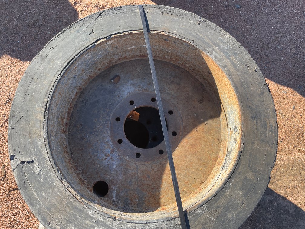 Set of (4) Solid Rubber Skid Steer Tires