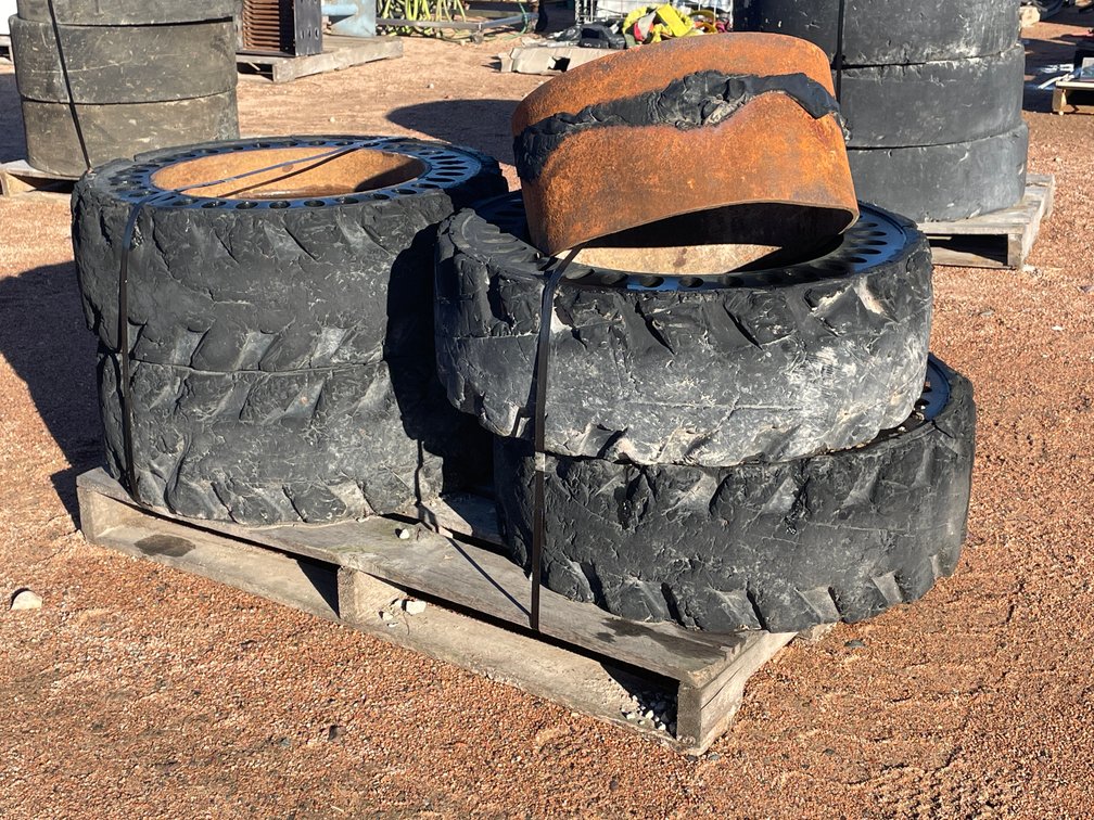 Set of (4) Solid Rubber Skid Steer Tires