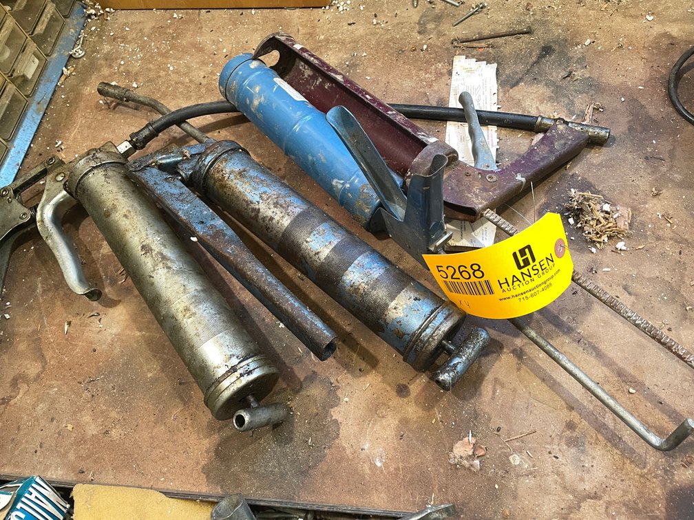 (2) Caulk Guns and (2) Grease Guns