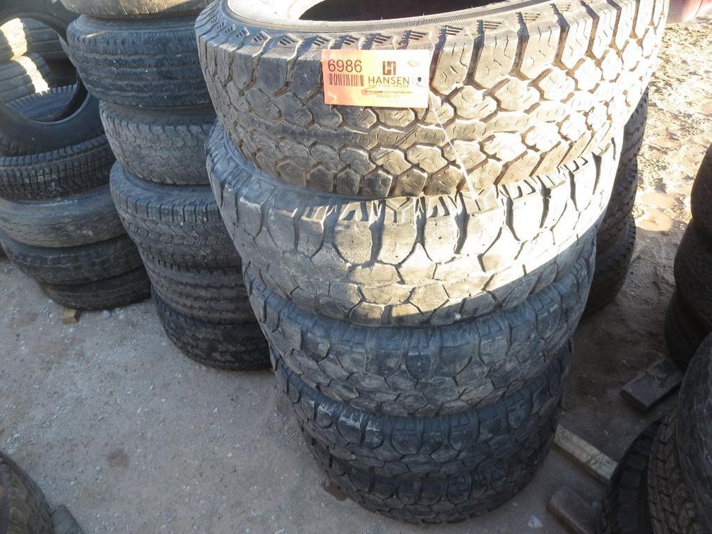 Set of Mud Claw Radial M/T LT245/75R17 on 8-Bolt Rims
