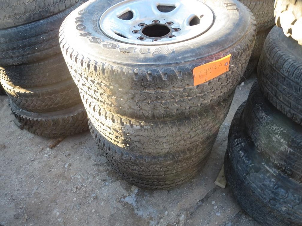 Set of Firestone TransForce AT Tires on 8-Bolt Rims