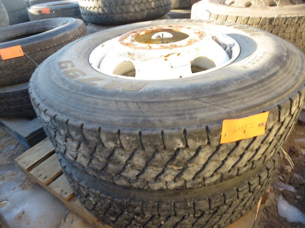 (2) Bridgestone M799 Tires on 10-Bolt Rims