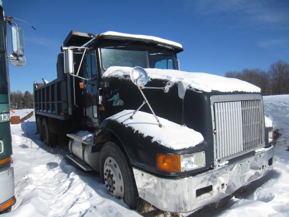 1991 International Tandem Axle Dump Truck. Vin 2HSFHBLR3MC049871, Miles Show 944,627, 3406B Cat Engine, 9 Speed Transmission. Rebuilt Hydraulic Ram. Butternut WI. For Questions Or Showing Call 715-661-0530.