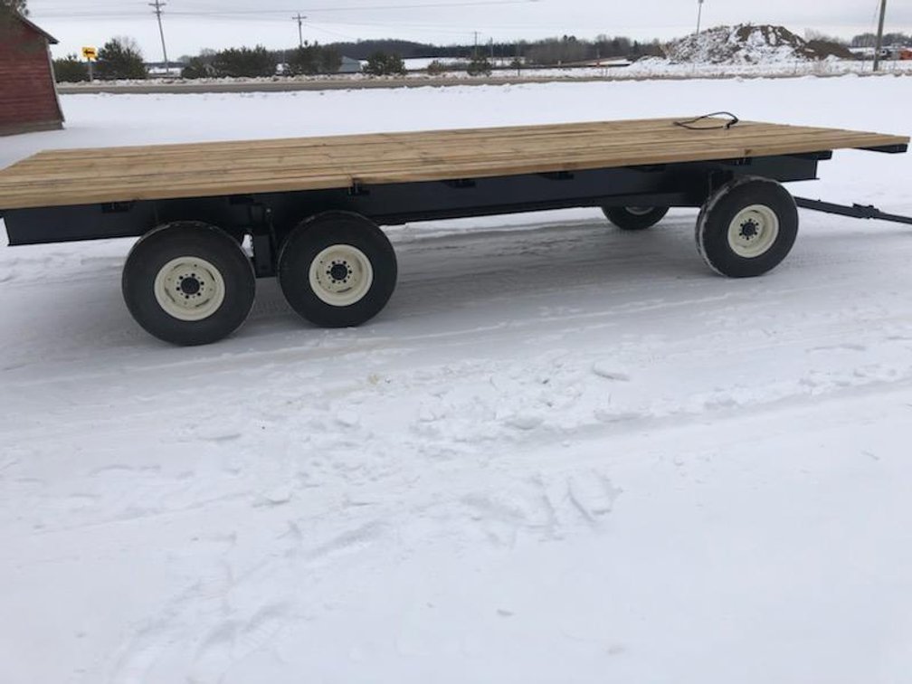 Hey Wagon/ Trailer, 12 Ton Running Gear, 9' Wide, 21' Long, 12" I Beams, Steel Cross Runners, 2 Inch Oak Planks, LED Lights, New Paint. Spencer WI. For Questions Or Showing Call 715-207-8576.