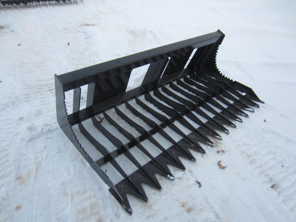 66" Skidsteer, Universal Rock Bucket. Spencer WI. 715-207-7129.