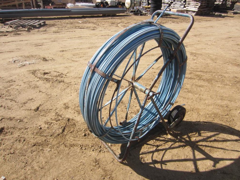 Roll of 3/8" Plastic Coated Fiberglass on Cart