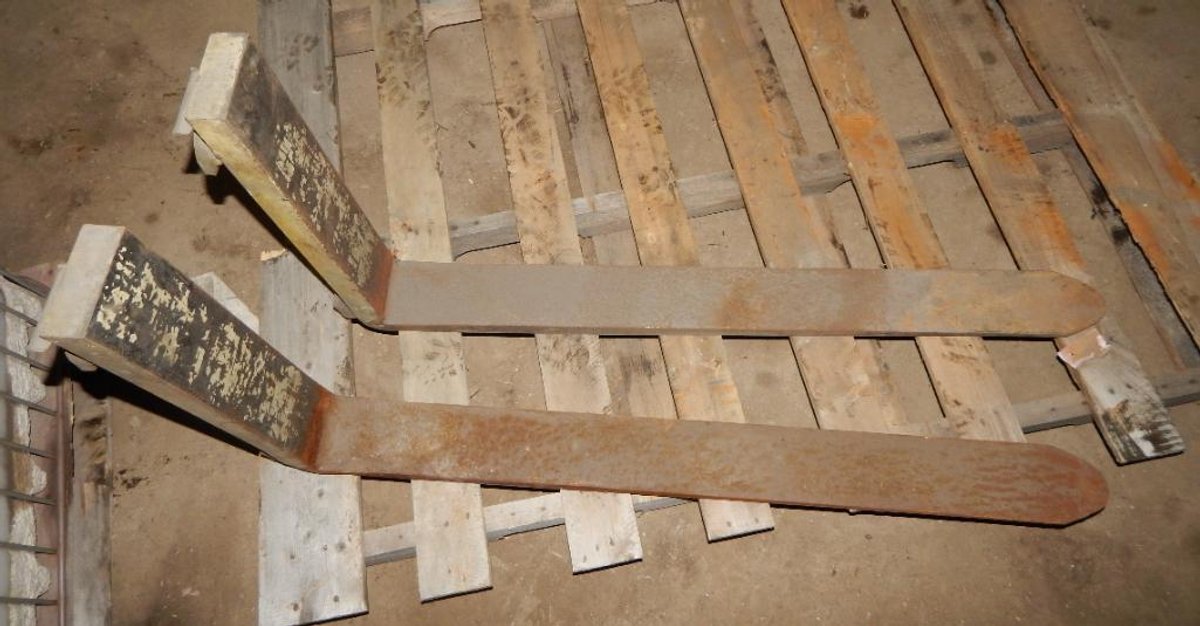 (2) Forklift Tines 42in. Long 16in. In Between Mounting Tabs (OS)