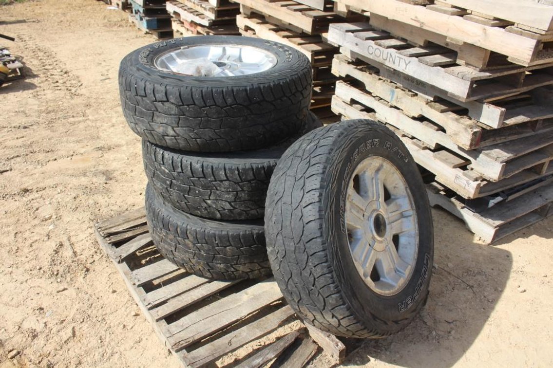 (4) GM 6 BOLT 18" ALUMINUM RIMS WITH TIRES AND LUGS