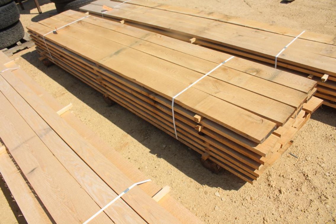 APPROXIMATELY 140 BOARD FT OF ROUGH SAWED OAK LUMBER