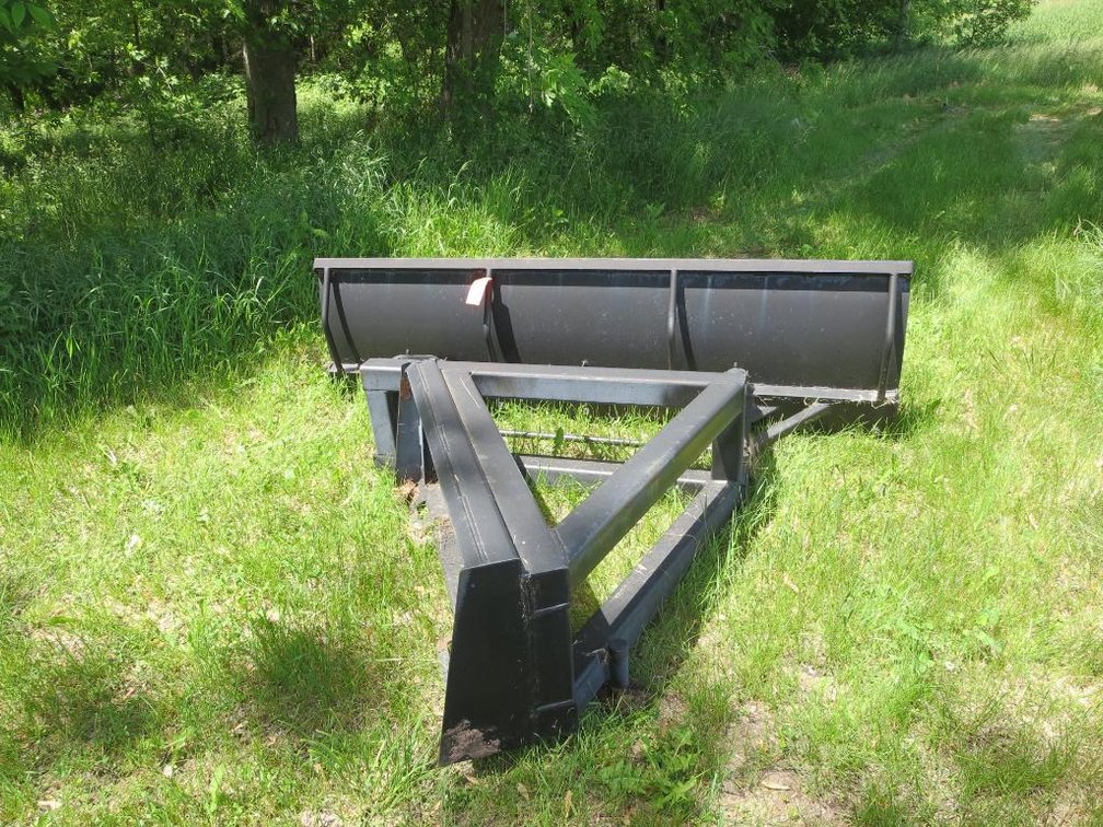 Skid Steer Feed Pusher for Mega Dairy