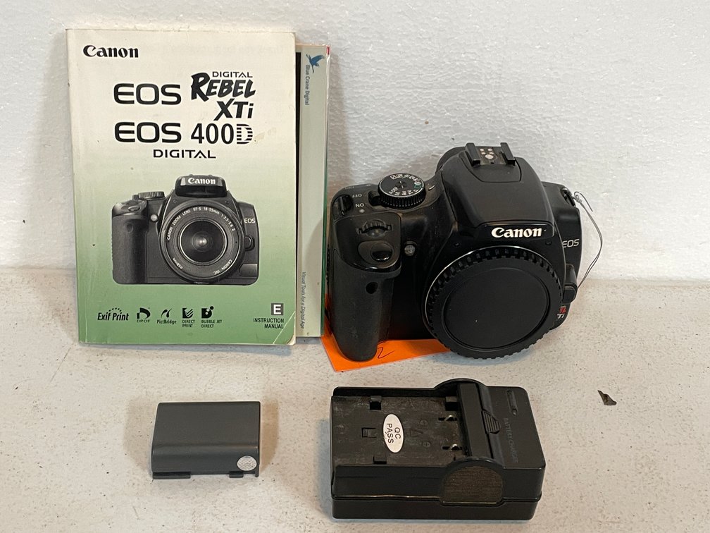 Canon Digital Camera, Body Only, XTI (A, top shelf)