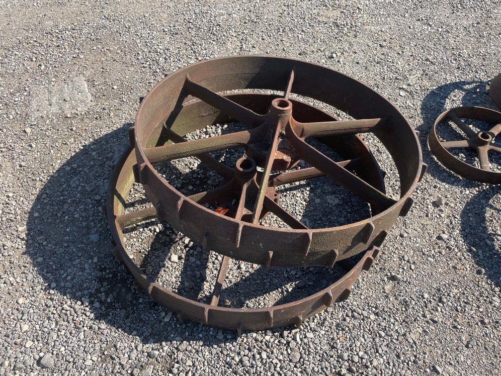 (2) Cast Wheels