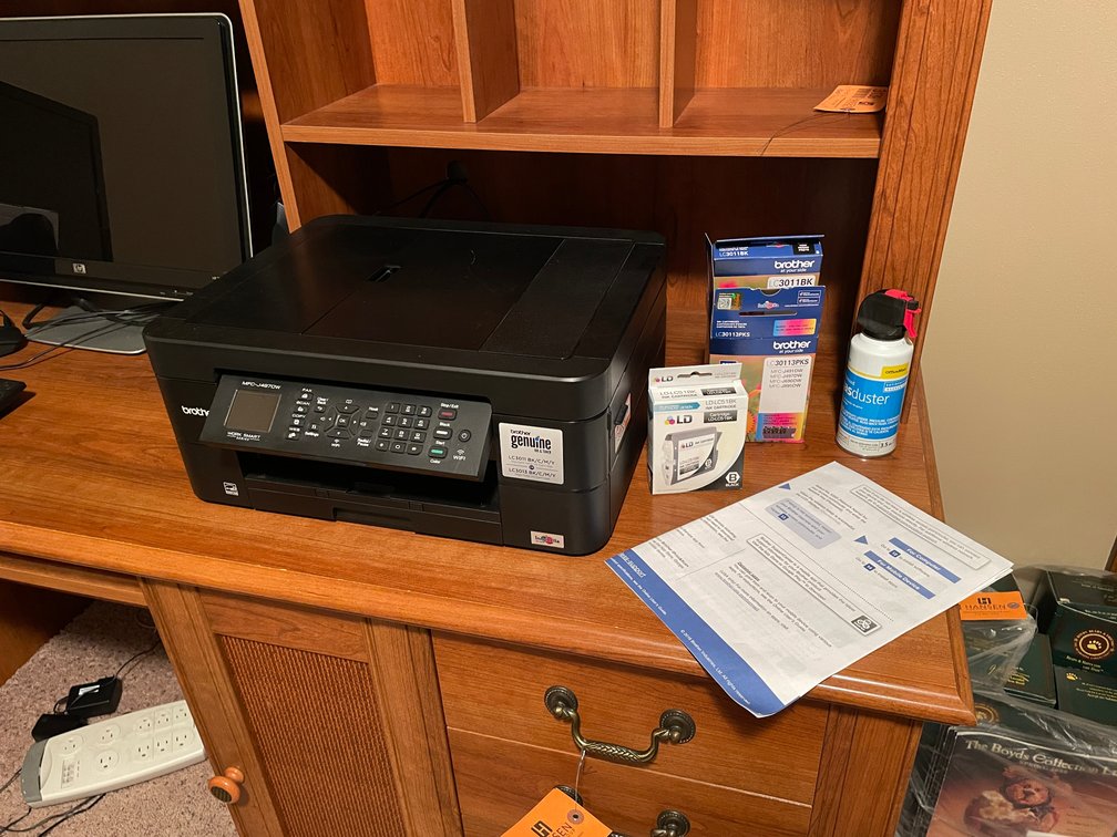 Brother Printer, Net gear Smart Wi-Fi router, and Lamp