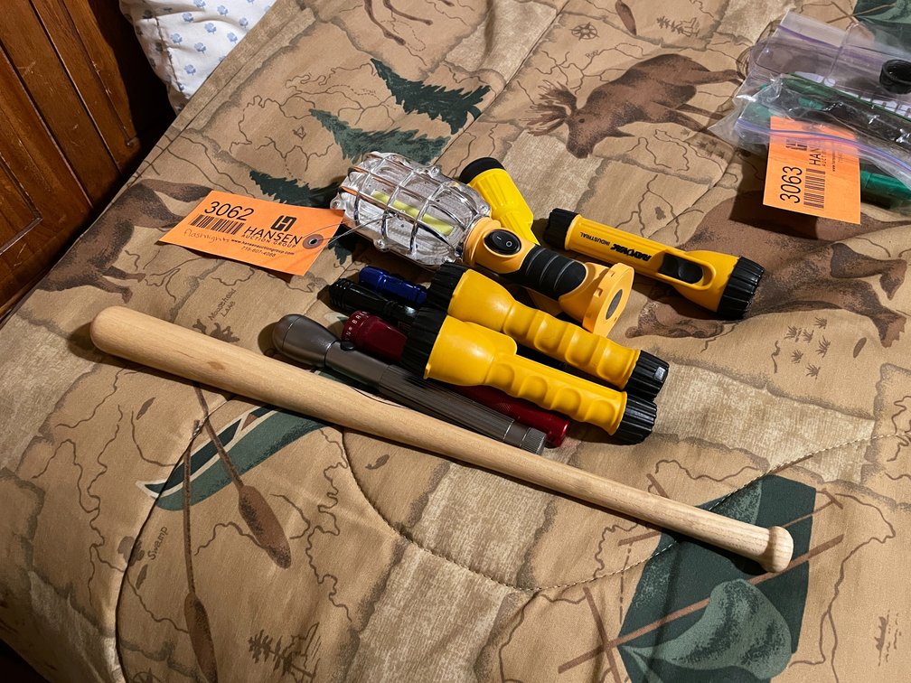 (9) Flashlights and (1) Louisville Slugger