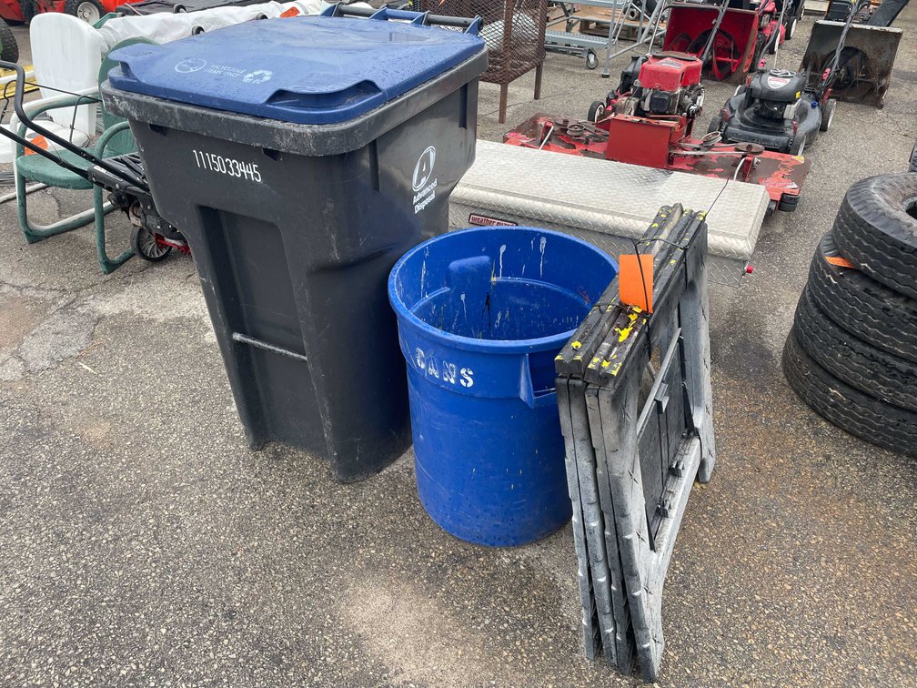 (2) Trash Cans and a Pair of Plastic Sawhorses (O3)
