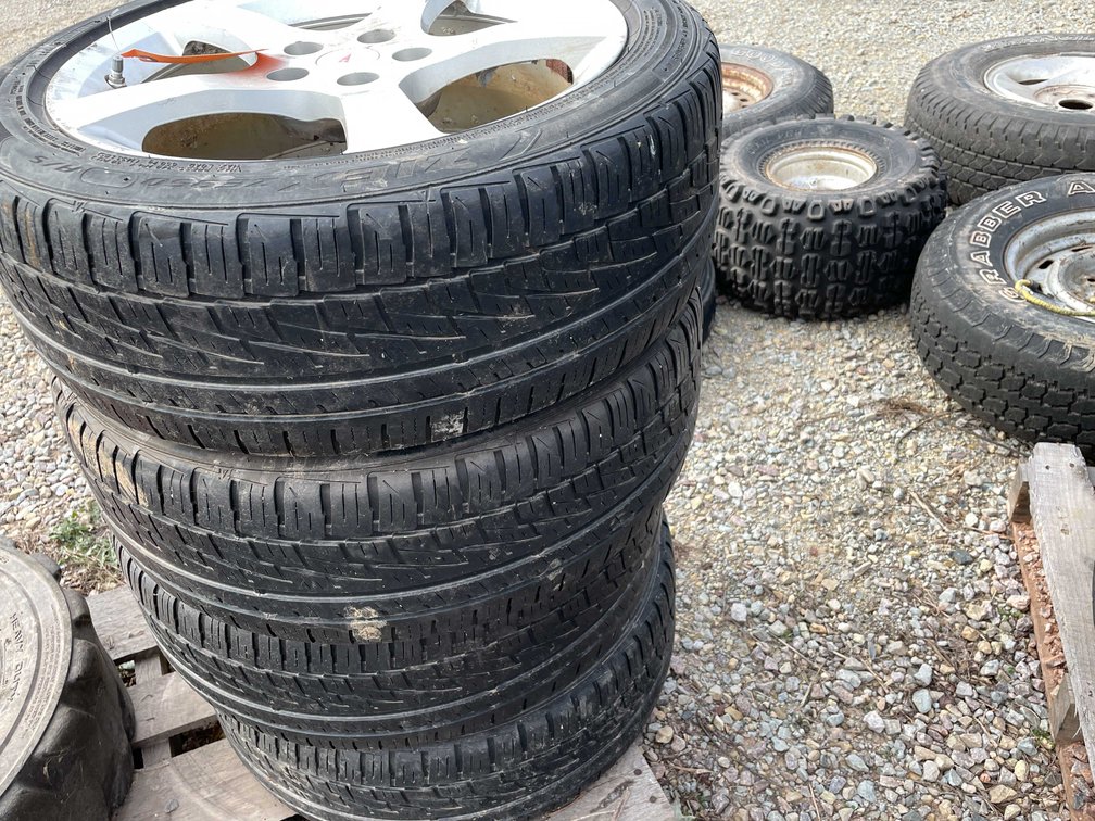 (4) Pontiac Wheels and Tires 