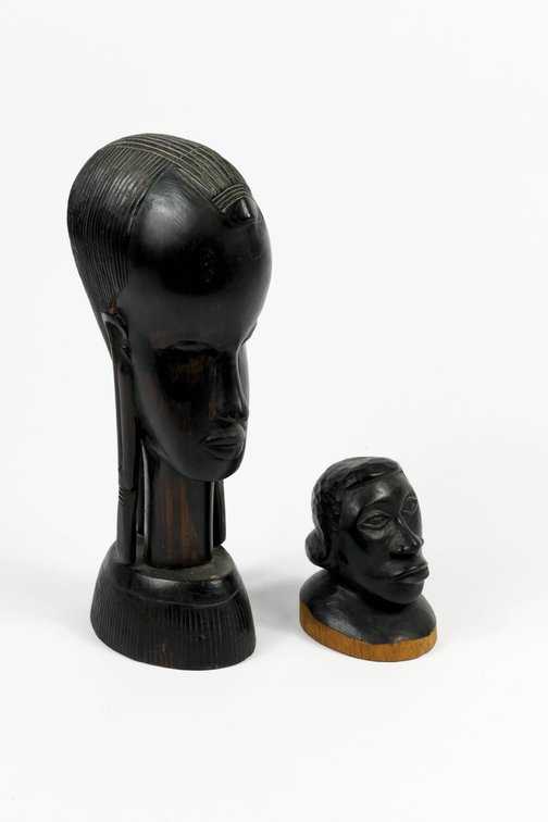 Pair of Carved Figural Head Sculptures