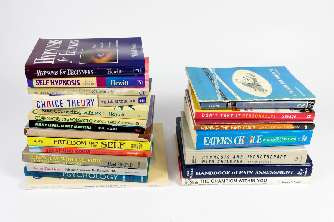 Two Stacks of Self Help and Psychology Books