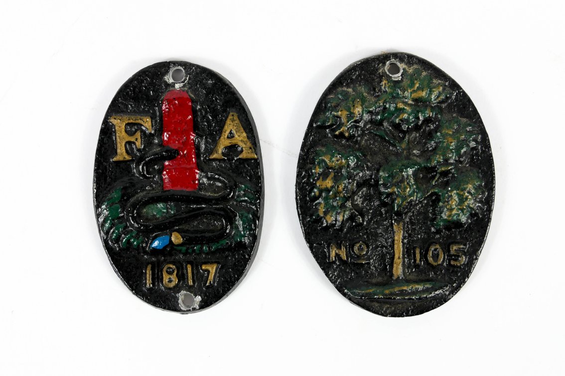Two Small Metal Fire Marks